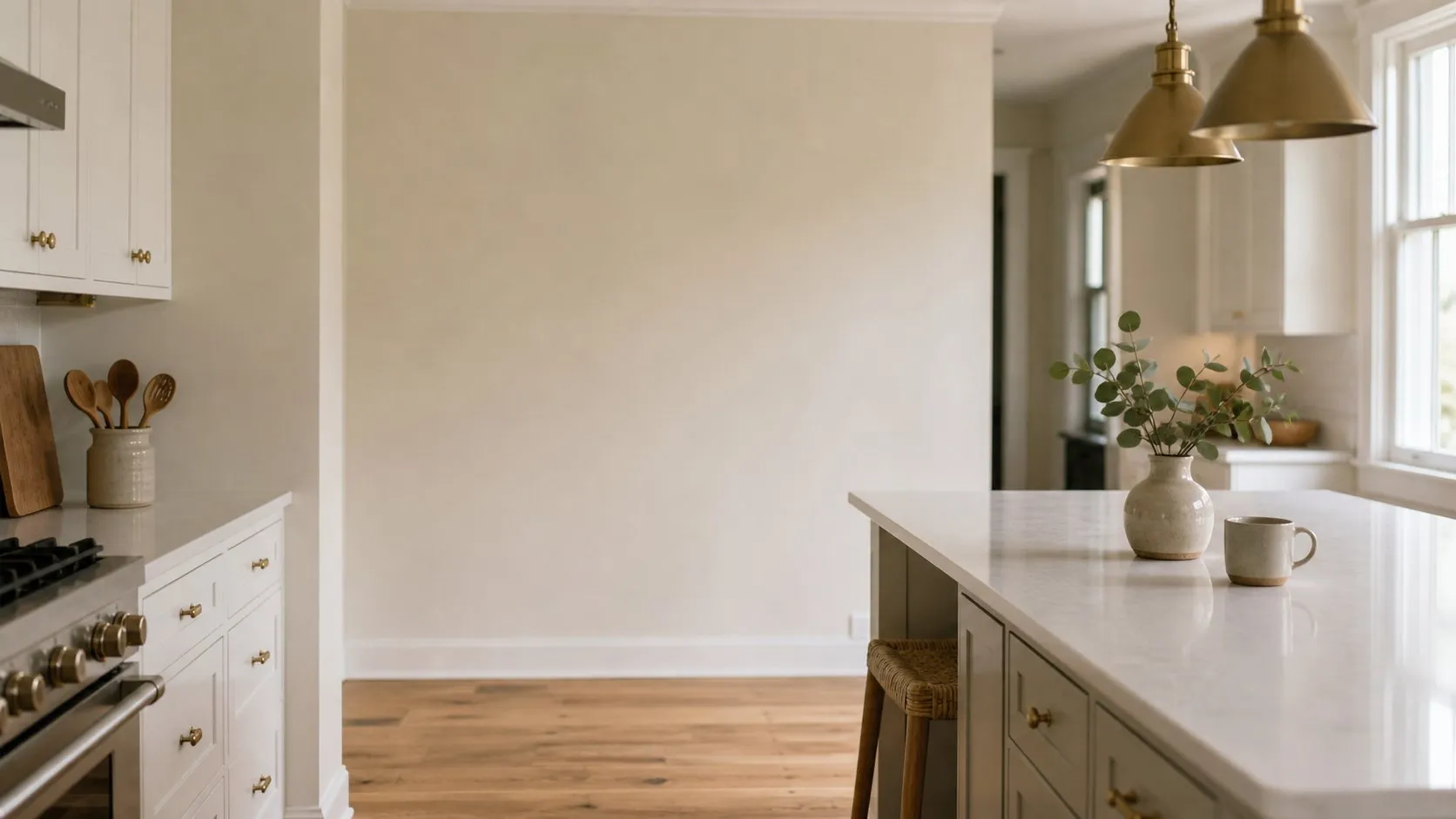 A freshly cleaned kitchen with a wiped-down island, polished countertops, and tidy open shelving in a Northern Virginia home.